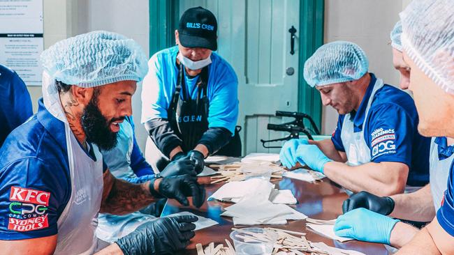 Monday 4 September 2023, Canterbury Bulldogs feeding the homeless for their Mad Monday celebration a Loaves and Fishes in Sydney. Photo: Supplied