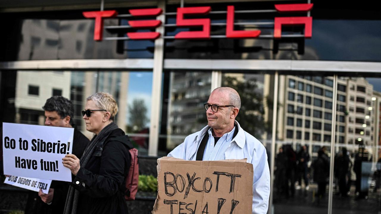 <!DOCTYPE html PUBLIC "-//W3C//DTD HTML 4.0 Transitional//EN" "http://www.w3.org/TR/REC-html40/loose.dtd"><html><body><p>The &acirc;&#128;&#152;Tesla Takedown&acirc;&#128;&#153; protesters are encourage people to sell their Teslas. Picture: Patricia De Melo Moreira/AFP</p></body></html>