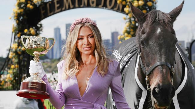 MELBOURNE, AUSTRALIA- NewsWire Photos OCTOBER 27, 2020: Melbourne Cup Carnival Ambassador Nadia Bartel with 2000 Melbourne Cup winner Brew at the Melbourne Cup Carnival Media Call in at The Mounting Yard in Flemington Racecourse. Picture: NCA NewsWire/ David Crosling
