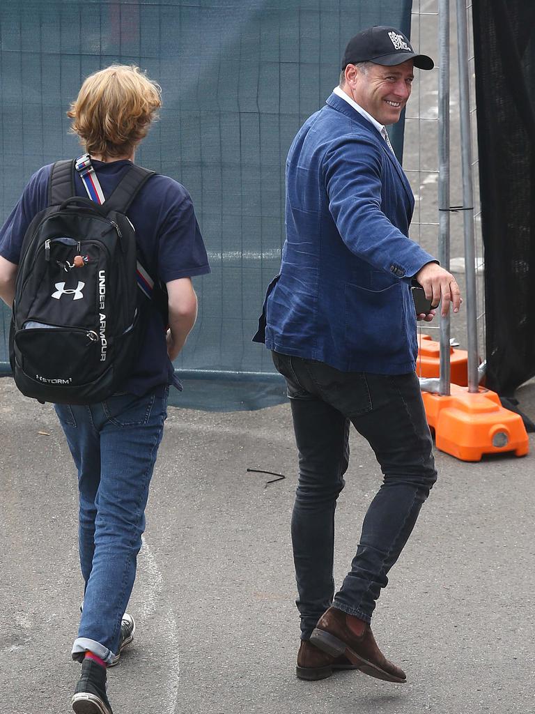 Karl and his son Jackson make their way through the airport. Picture: Matrix Pictures