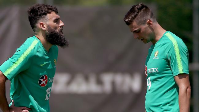 Socceroos captain Mile Jedinak (left) and striker Tomi Juric look set to get game time against Hungary.