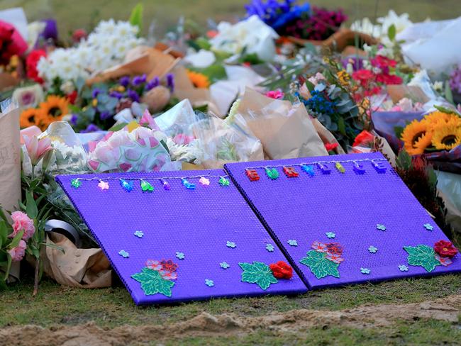 Flowers and tributes at the vigil for Eurydice Dixon. Picture: Mark Stewart