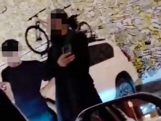 A late-night dashcam video showing a tense standoff over a CBD parking spot has ignited online debate, after a driver said they were threatened by two people refusing to move from a public car park.The incident happened just after midnight on Sunday on Rosina St in Adelaide’s West End. Picture: Supplied