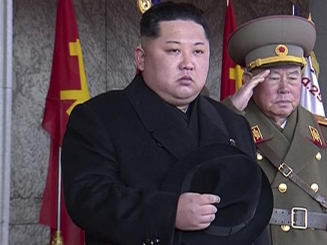 In this image made from video by North Korea's KRT, North Korean leader Kim Jong Un, center, attends a military parade in Pyongyang, North Korea Thursday, Feb. 8, 2018. North Korea held the military parade and rally on Kim Il Sung Square on Thursday, just one day before South Korea hosts the opening ceremony of the Pyeongchang Winter Olympics. (KRT via AP Video)