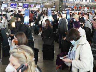 Pics show long weekend airport chaos