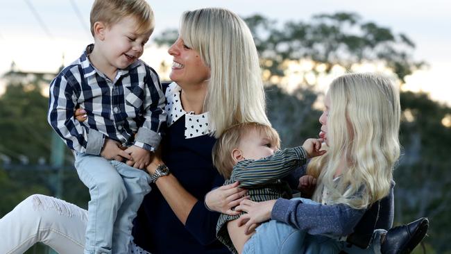 Jenny Duggan with her children Max, Seb, and Maddy at their home.