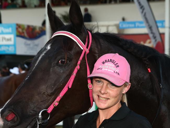 Jockey Noel Callow and trainer Trinity Bannon with Scherzoso after winning the Cairns Amateurs Handicap sprint at Cannon Park. PICTURE: BRENDAN RADKE