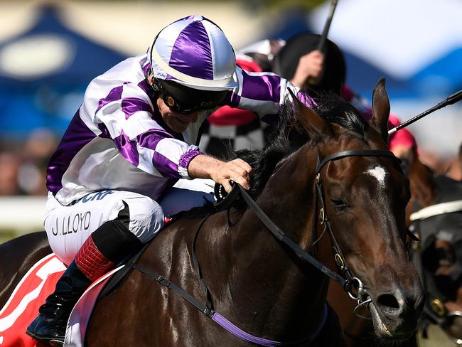 Jeff Lloyd rides Ef Troop (left) to victory in race 2, the Colts, Geldings and Entires Class 6 Handicap, during the Doomben 10000 Day at Doomben Racecourse in Brisbane, Saturday, May 11, 2019. (AAP Image/Albert Perez) NO ARCHIVING, EDITORIAL USE ONLY