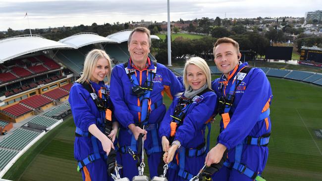 New attraction. The Adelaide Oval RoofClimb was launched in 2016 and has become a popular activity in SA. Pictured: Stillwell Management Consultants staff climb to the top of Adelaide Oval as part of a team building exercise. L-R Lauren Wright, Daryl Stillwell , Alexandra Rosser, and Nick Stillwell. Picture Mark Brake