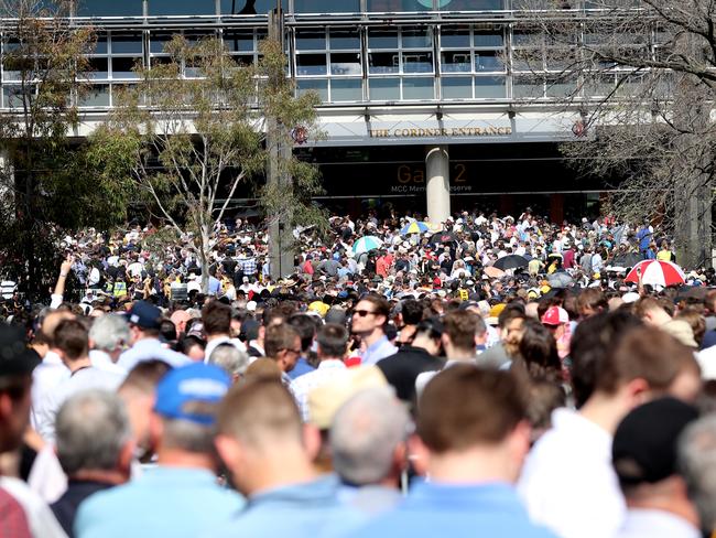 Thousands of fans line up to get into the MCG. Picture: Alex Coppel.