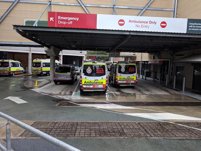 Ambulances queue at Ipswich Hospital yesterday.