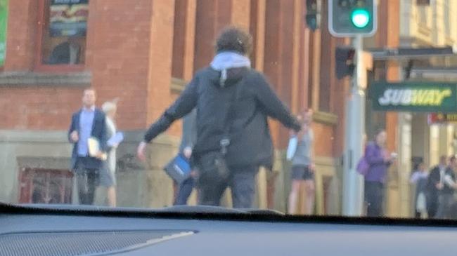 The man was seen brandishing a knife on Clarence St, Sydney. Picture: Twitter / @Ayusha77