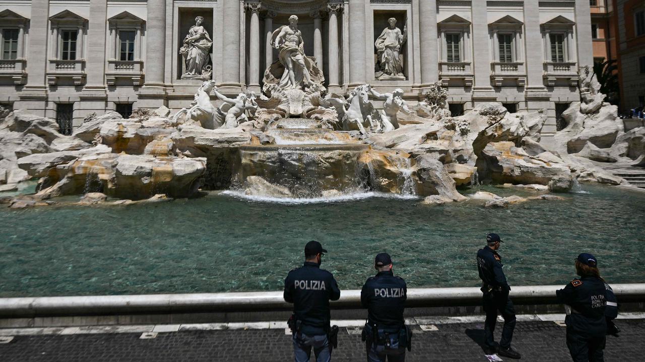 Police stand guard after the protesters were removed. Picture: Filippo Monteforte/AFP