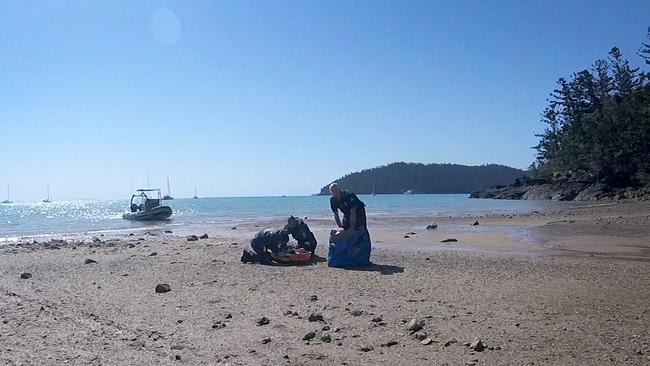 A still from the GoPro footage as paramedics arrive on Whitsunday Island. Picture: RACQ CQ Rescue