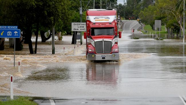 Sunday February 9. Heavy rain causes flooding in North Queensland. Flooding at Plantation Creek in Ayr cuts Bruce Highway to traffic apart from trucks. Picture: Evan Morgan