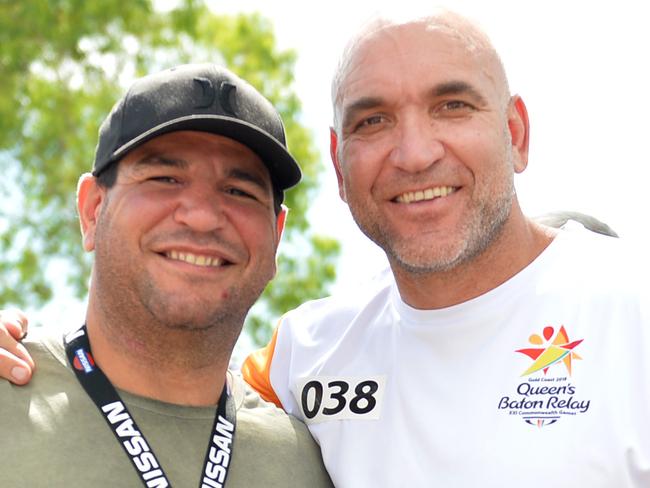 Last Baton Bearer in Townsville Gorden Tallis with Carl Webb - Commonwealth Games 2018 Queens Baton Relay (QBR) - Townsville. Picture: Alix Sweeney