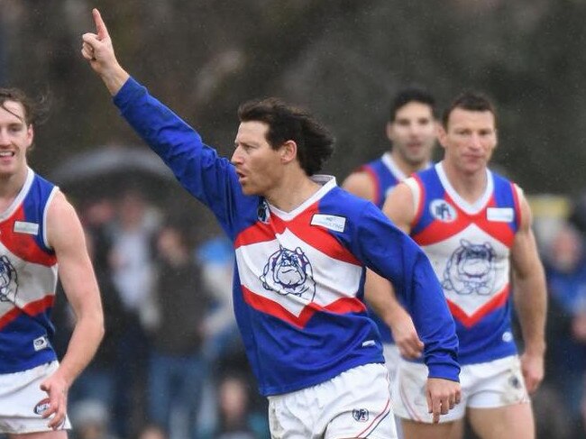 Shane Harvey celebrates a goal for North Heidelberg. Picture: Nathan William Media