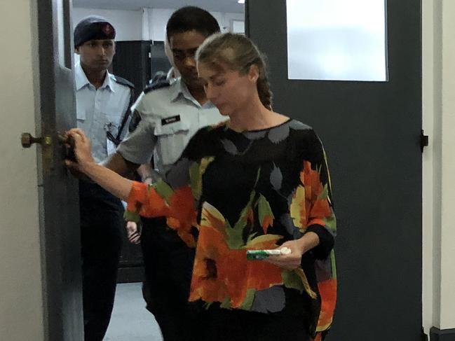 Yvette Nikolic exiting the courthouse before the hearing resumed at the Suva High Court. Picture: Varanisese Bolatagane