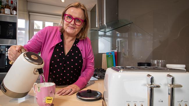 Ellen McLeod in her Kirribilli kitchen. She says people need to shop around when it comes to electricity. Picture: Julian Andrews