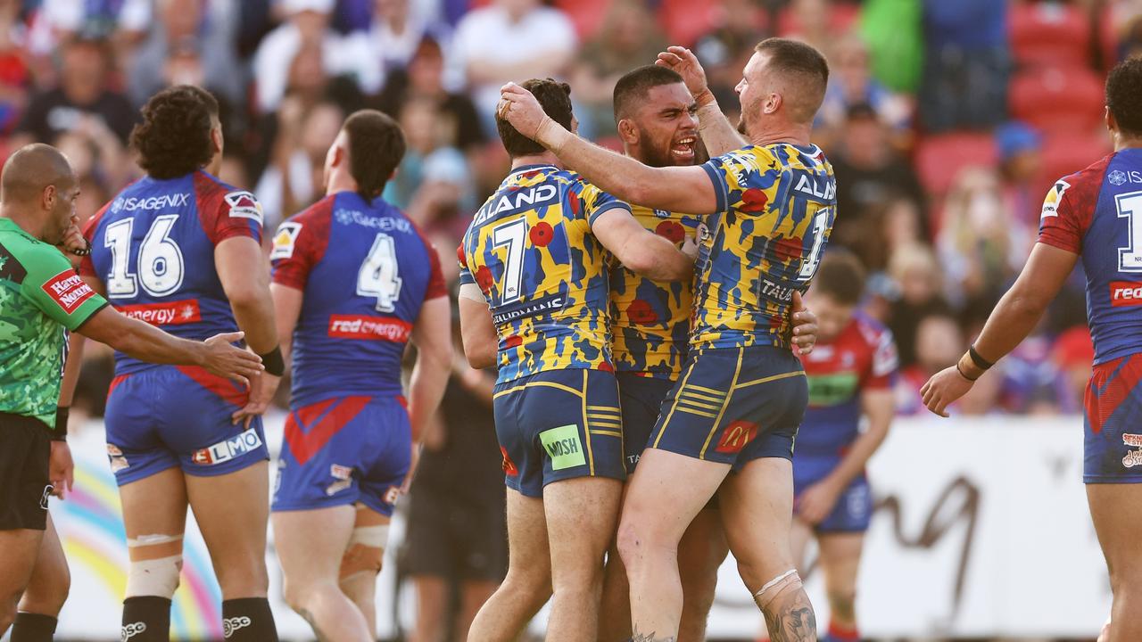 NEWCASTLE, AUSTRALIA - APRIL 24: Isaiah Papali'i of the Eels celebrates with team mates after scoring a try during the round seven NRL match between the Newcastle Knights and the Parramatta Eels at McDonald Jones Stadium, on April 24, 2022, in Newcastle, Australia. (Photo by Matt King/Getty Images)
