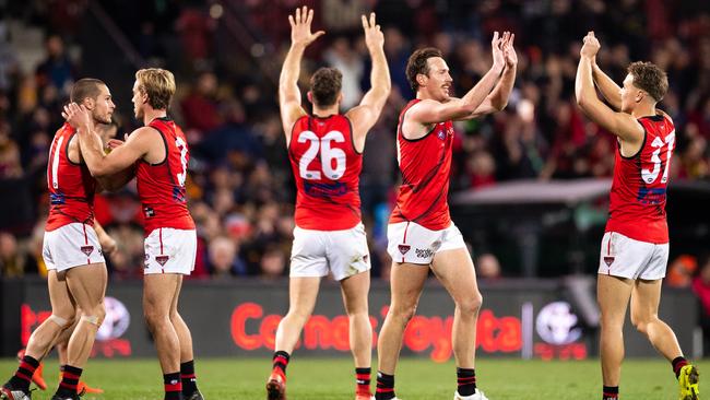 Jubilant Essendon players after their win against the Crows. Picture: Getty Images