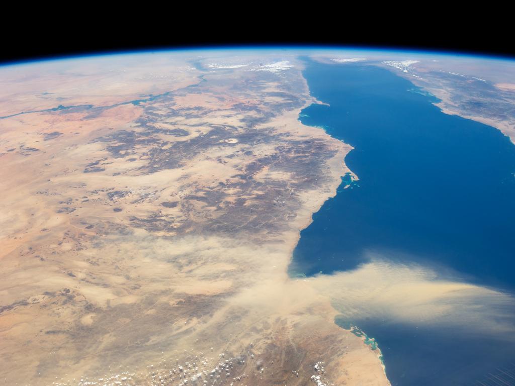 A dust plume extends into the Red Sea. Thousands of years of similar dust storms out of the Sahara and over the Atlantic maps a 20,000 year cycle of fertility and famine.