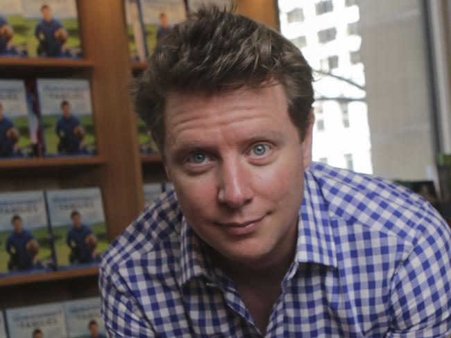 Author Scott Pape poses for a photograph at the launch of his new book "Barefoot Investor for Families" at the State Library in Melbourne, Monday, September 24, 2018. (AAP Image/Wayne Taylor) NO ARCHIVING