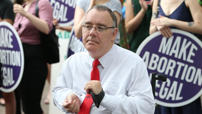 This peacekeeping compromise is being threatened by Cairns MP Rob Pyne’s private member’s bill to abolish any legal restraint on abortion. Above, Rob Pyne at a rally at Parliament yesterday. Photo: Annette Dew