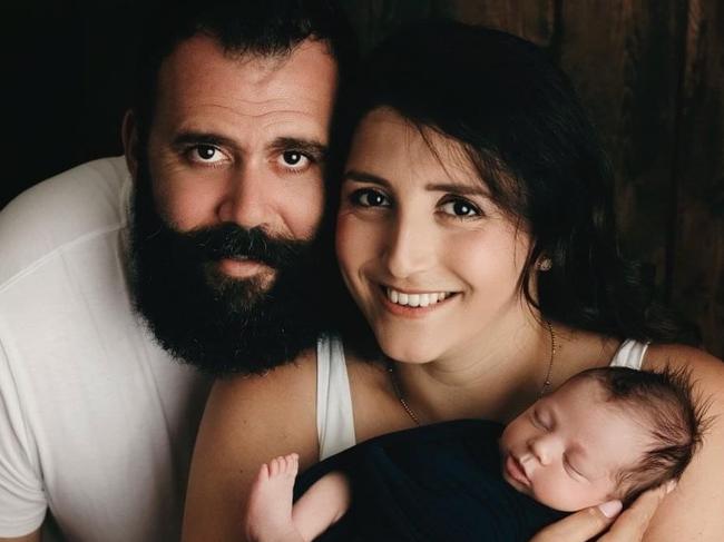 WEEKEND NEWSPAPERS SPECIAL. PLEASE CONTACT WEEKEND PIC EDITOR JEFF DARMANIN BEFORE PUBLISHING. Mira Abunucerah Haddad, husband Daniel Haddad with newborn Thomas, who was born by surrogate in Canada and can't get home.