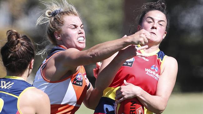 Jacinda Barclay punches the ball away from Eloise Jones. Picture: Sarah Reed