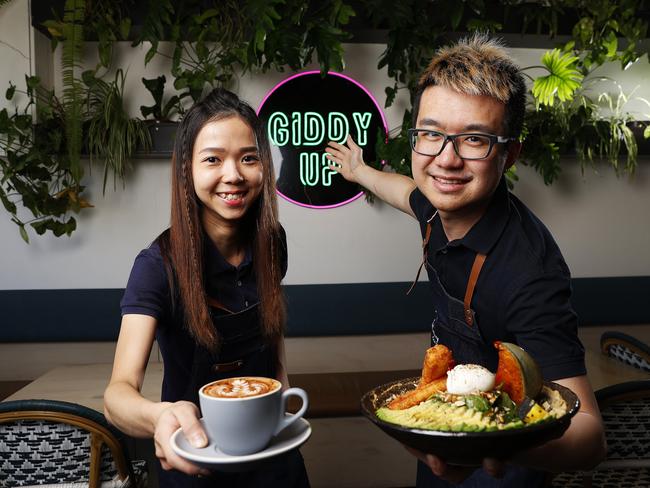 Owners of Giddy Up Foodstore, in Sandy Bay, Alfa and Harry Lee love welcoming customers to their store even the four-legged variety. Picture: Zak Simmonds