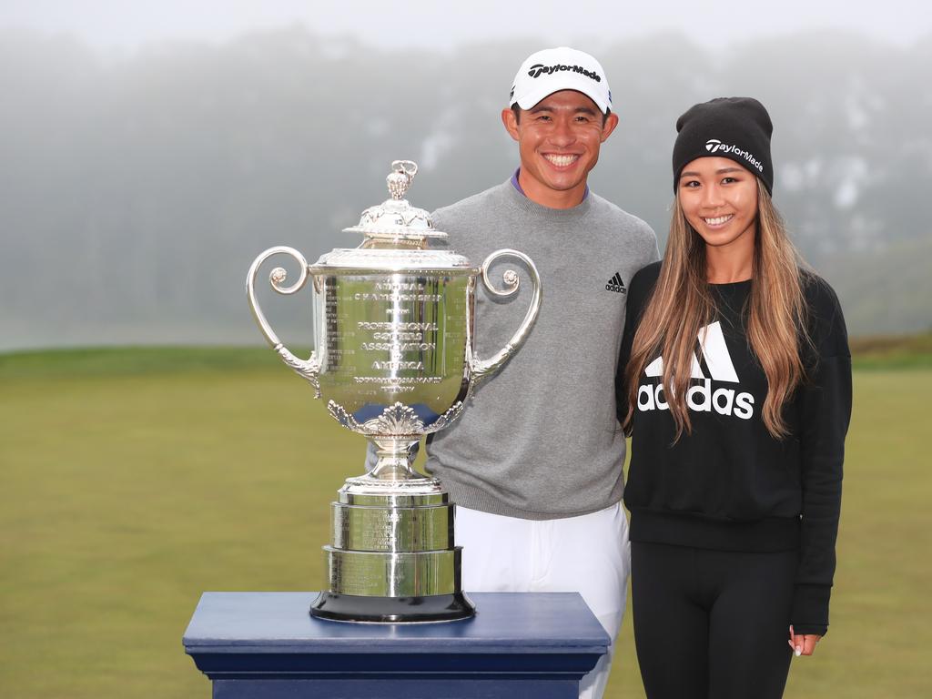 Collin Morikawa celebrates with the Wanamaker Trophy and girlfriend Katherine Zhu after winning the 2020 PGA Championship. (Photo by Tom Pennington/Getty Images)