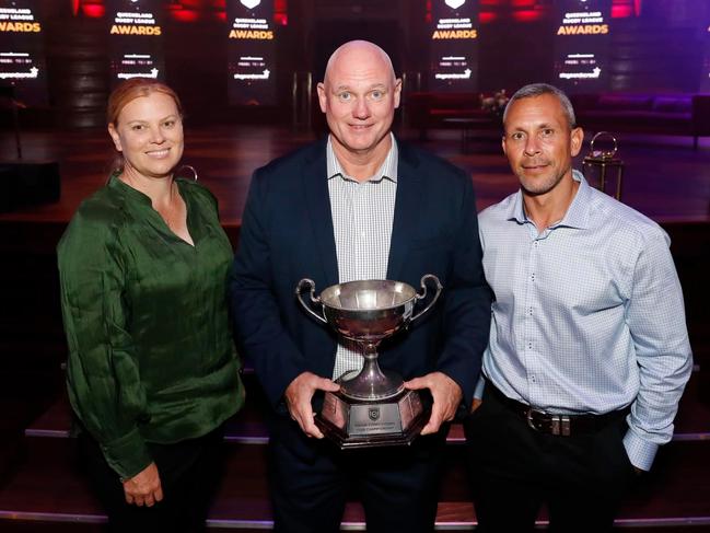 CEO Peter White (centre) with the QRL's Club Championship award, which was awarded to the CQ Capras in 2022. He is flanked by Amanda Ohl who won the BMD Premiership Coach of the Year and Lionel Harbin who was named the Hostplus Cup Coach of the Year. Photo: J&amp;A Photography - Josh Woning