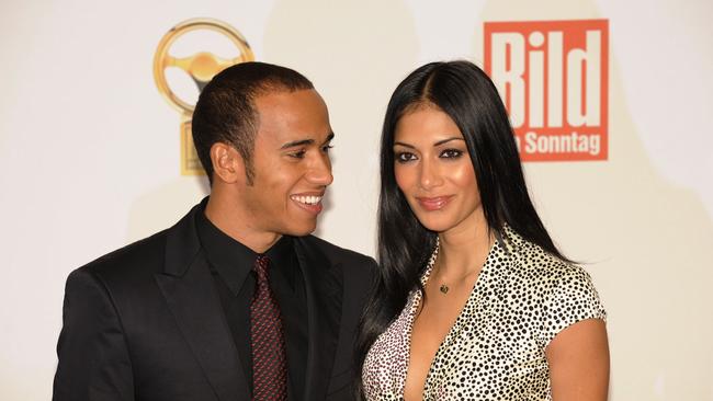 Hamilton and his partner Scherzinger were inseparable through those early years. Often attending award shoes and track events hand in hand. Here they are attending the Goldenes Lenkrad 2008 (Golden Wheel) awards on November 5, 2008 in Berlin. Photo: AFP PHOTO DDP