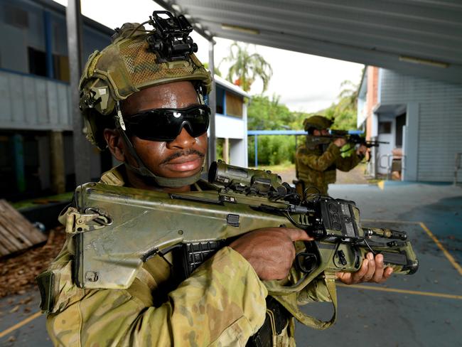 Soldiers from 3RAR perform urban training at the former Stuart State School. Private Moses Kormah. Picture: Evan Morgan