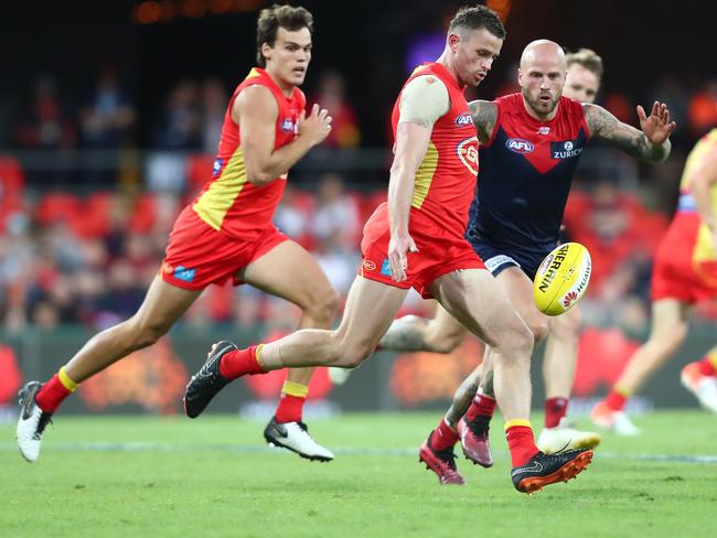 Pearce Hanley of the Suns kicks during the round eight AFL match between the Gold Coast Suns and the Melbourne Demons at Metricon Stadium on May 11, 2019 in Gold Coast, Australia. (Photo by Chris Hyde/Getty Images)