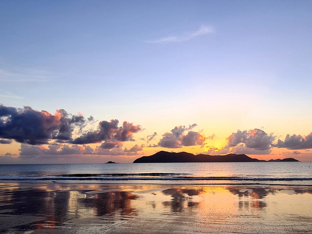 Sunrise at Mission Beach, looking out to Dunk Island. Picture: Brian Golding