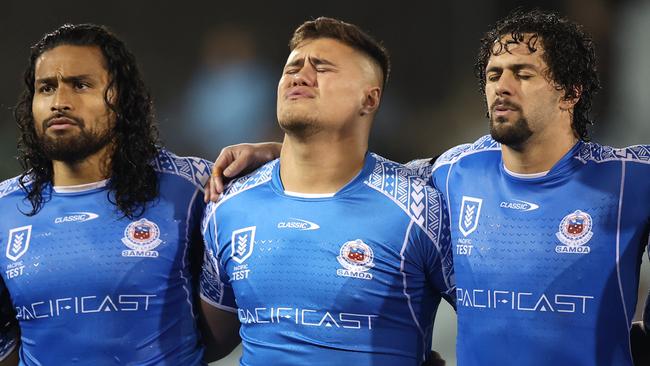 Josh Schuster, centre, shed a tear during the national anthem. Picture: Mark Kolbe/Getty Images