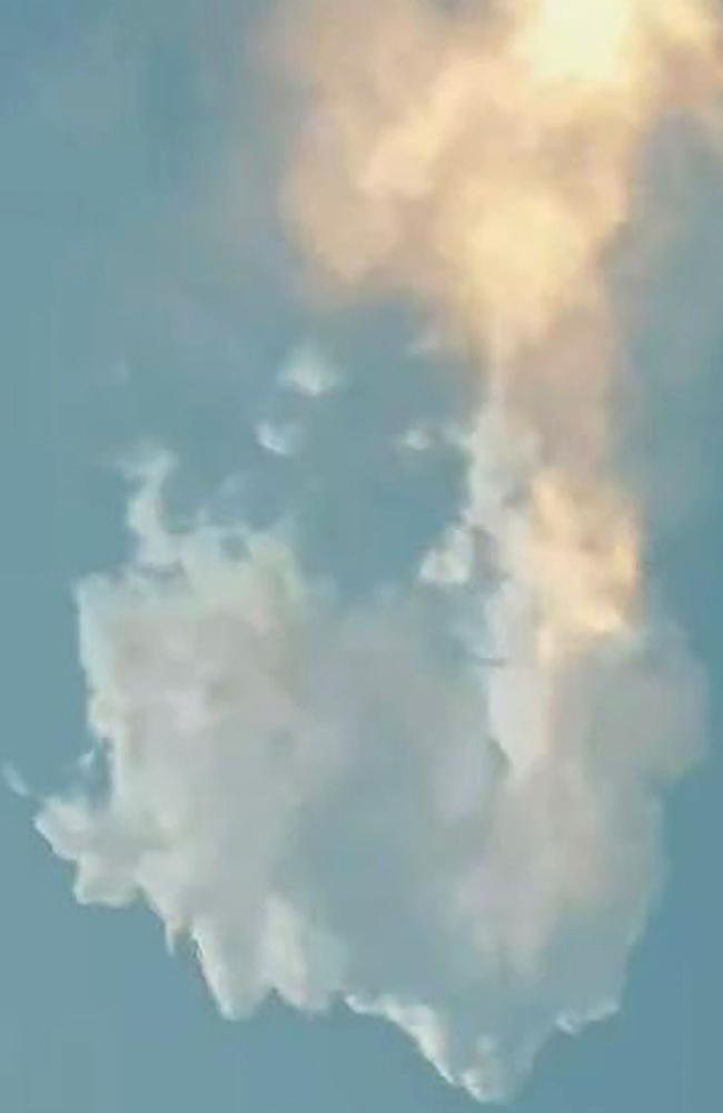 This still image taken from a SpaceX video shows the SpaceX Starship exploding after launch. (Photo by Handout / SPACEX / AFP)