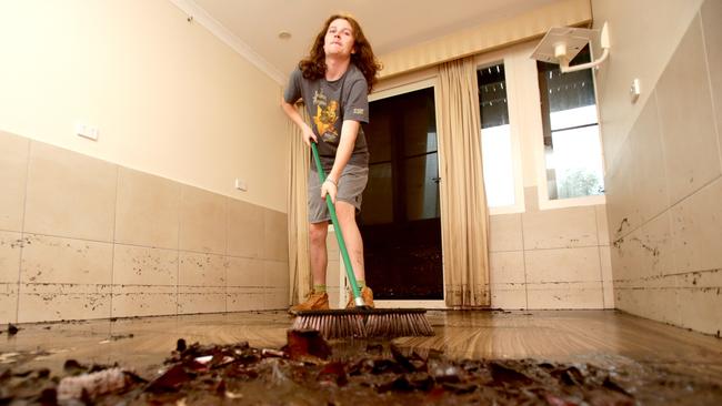 Kobey Styles, cleaning out her house in Paddington after flooding in February 2022. Photo: Steve Pohlner