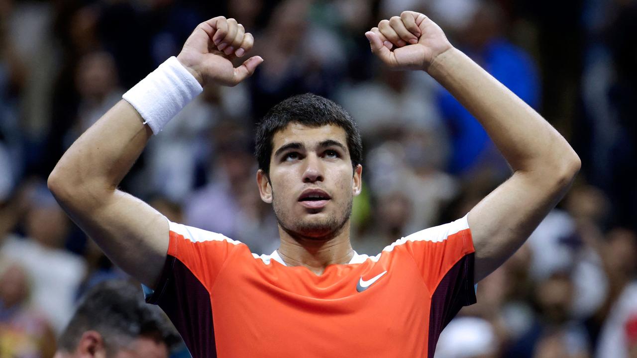 Spain's Carlos Alcaraz celebrates. Photo by KENA BETANCUR / AFP