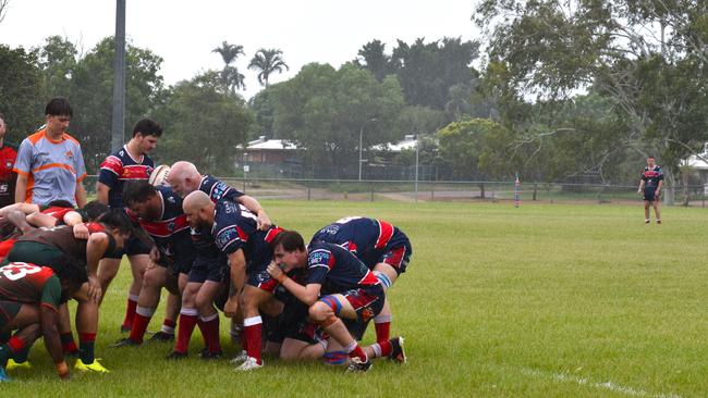 Dennis Bree packs the scrum while Hamish is lining up at fullback in the background. Picture: Darcy Jennings