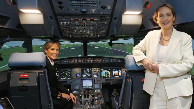 Qantas first officer Lauren MacLean and CEO Vanessa Hudson in the cockpit of the A320 flight simulator at the Sydney Flight Training Centre on Thursday. Picture: John Appleyard/NewsWire