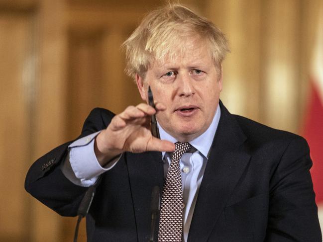 British Prime Minister Boris Johnson banned public gatherings, stopping any non-essential travel and telling everyone to work from home if they can. Picture: AP