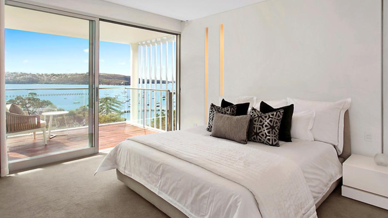 Every bedroom has water views — and the master also has a walk-in wardrobe and balcony. Picture: Matrix