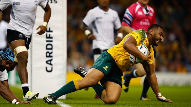 Sekope Kepu goes over to score the Wallabies third try of the night.