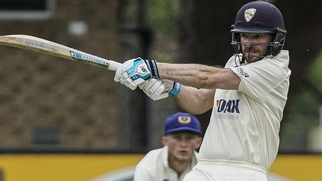 Whack: Brendan McGuiness hits out for his Oakleigh team. Picture: Valeriu Campan