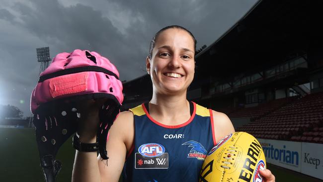 Adelaide Crows footballer Heather Anderson has been given permission to wear a pink helmet during the football games.