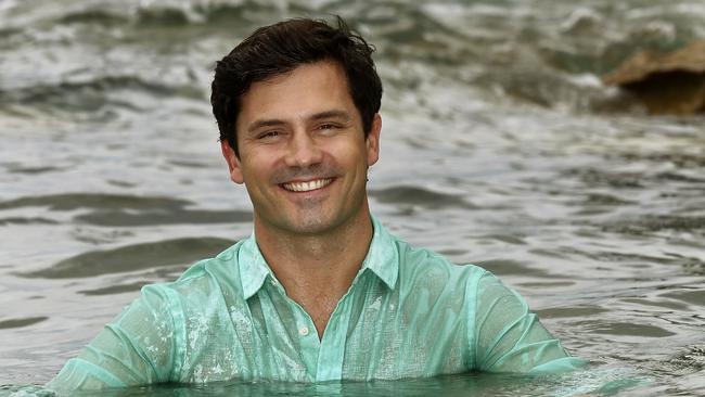 Mosman artist and ocean lover Tim Johnston at Edwards Beach. Picture: John Appleyard