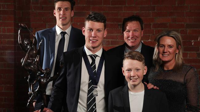 Carlton’s 2019 AFL Rising Star winner Sam Walsh with his family. Parents Wayne and Jacque and brothers Henry and Thomas. Picture: Michael Klein.